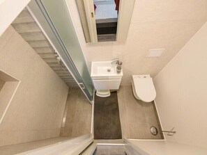 Departamento, varias camas | Baño