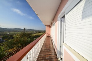 Appartement, meerdere bedden | Balkon