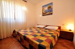 Apartamento, várias camas | Wi-Fi de cortesia, roupa de cama