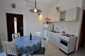 Apartment, Multiple Beds | Private kitchen | Oven, stovetop, cookware/dishes/utensils - Apartments Pave Strancica (Postira)