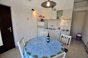 Apartment, Multiple Beds | Private kitchen | Oven, stovetop, cookware/dishes/utensils - Apartments Pave Strancica (Postira)