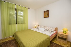Apartamento, várias camas | Comodidades da propriedade