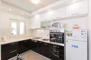 Apartment, Multiple Beds | Private kitchen | Stovetop, cookware/dishes/utensils - Apartments Antonia Podstrana (Podstrana)