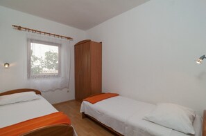 Appartement, Plusieurs lits | Accès au Wi-Fi (inclus), literie fournie