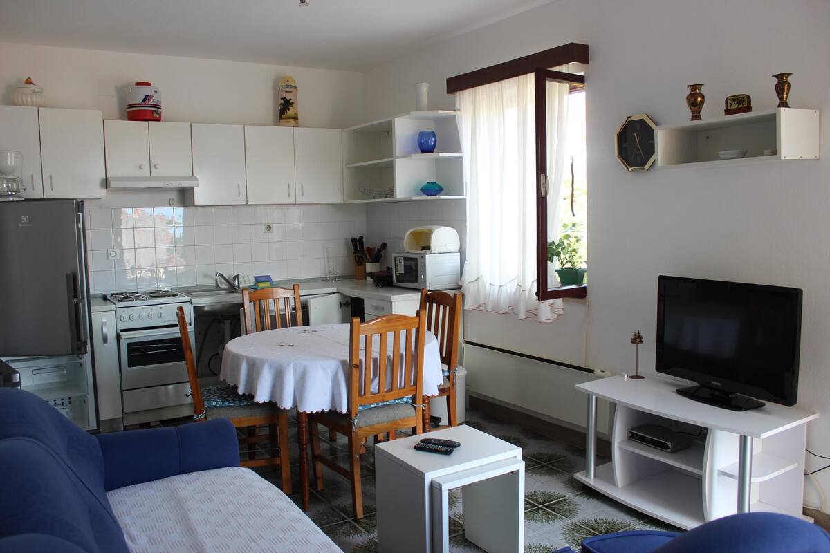 Apartment, Multiple Beds | Living room | TV