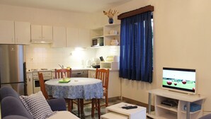 Apartment, Multiple Beds | Living room | TV - Apartments Marinović (Supetar)