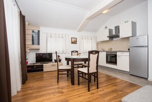 Apartment, 1 Double Bed with Sofa bed | Private kitchen | Oven, stovetop, cookware/dishes/utensils - Apartments Vladimir 2835 / One Bedroom A4 (Rab)