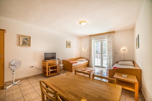 Appartement, 2 lits jumeaux | Accès au Wi-Fi (inclus), literie fournie