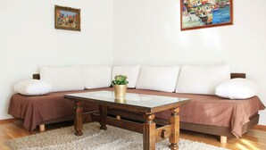 Apartment, Mehrere Betten | Wohnzimmer