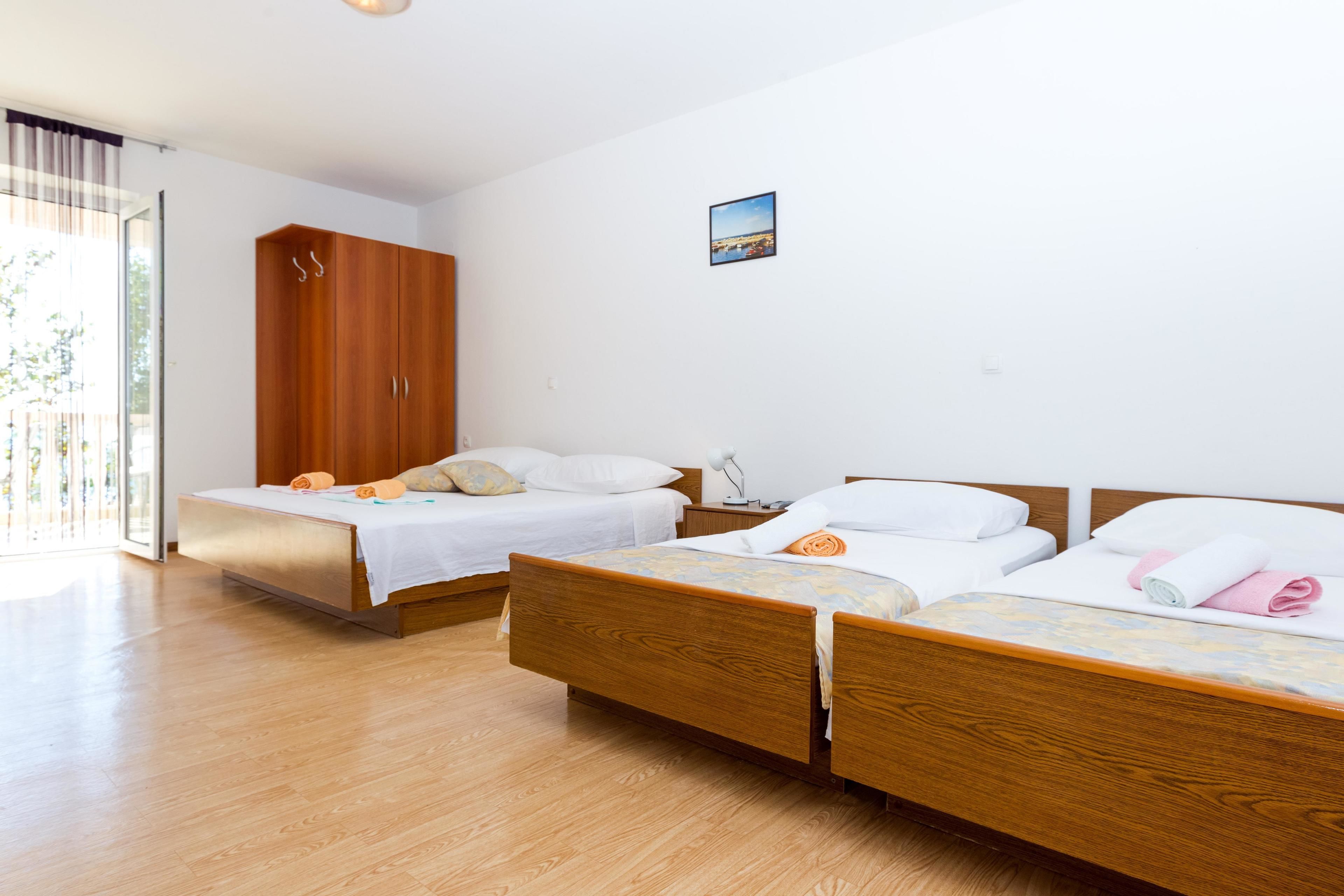Apartamento, várias camas | Wi-Fi de cortesia, roupa de cama