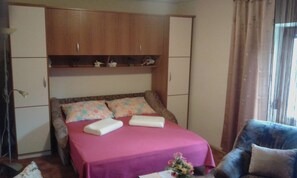 Apartment, 2 Double Beds | Private kitchen | Fridge, microwave, stovetop, coffee/tea maker