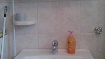 Apartment, 2 Double Beds | Bathroom | Shower, hair dryer, towels