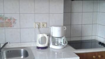 Apartment, 2 Double Beds | Private kitchen | Fridge, microwave, stovetop, coffee/tea maker