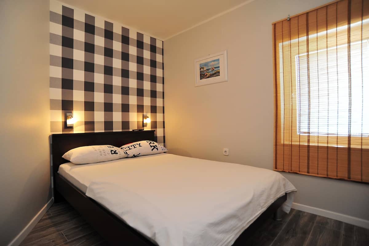 Apartamento, varias camas | Ropa de cama