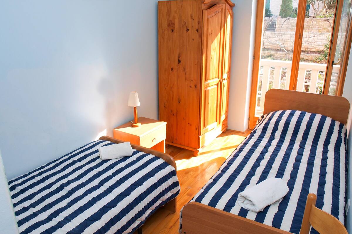 Appartement, Plusieurs lits | Accès au Wi-Fi (inclus), literie fournie