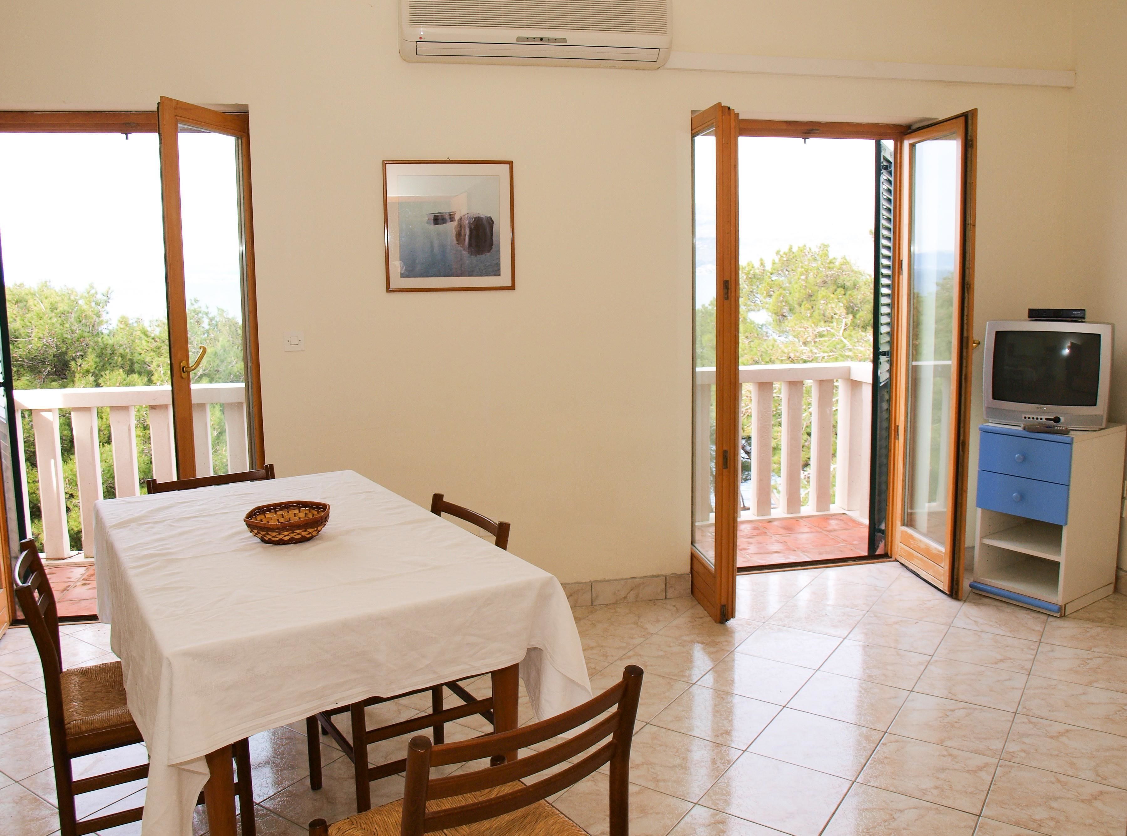 Apartment, Multiple Beds | Living room | TV