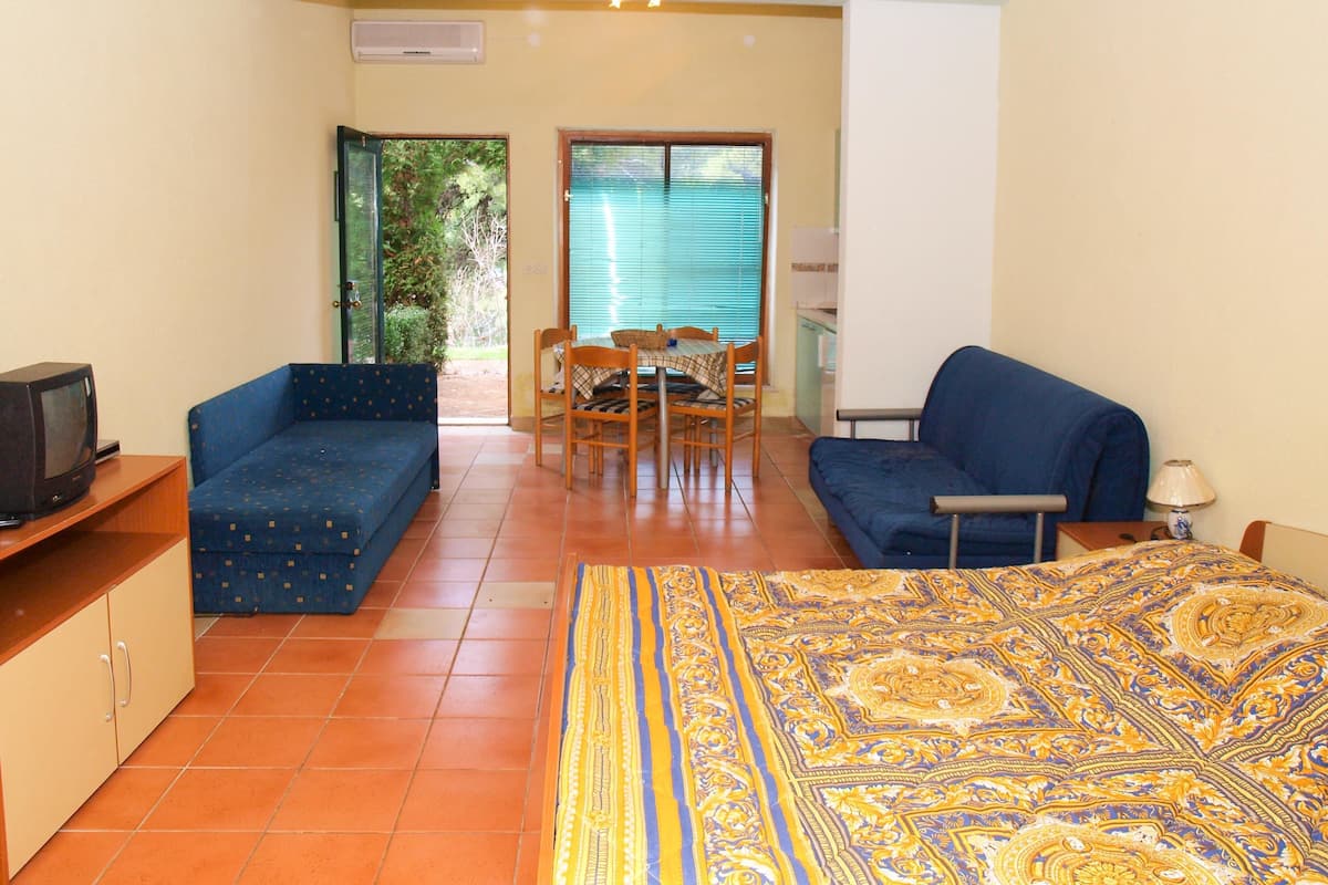 Appartement, Plusieurs lits | Accès au Wi-Fi (inclus), literie fournie