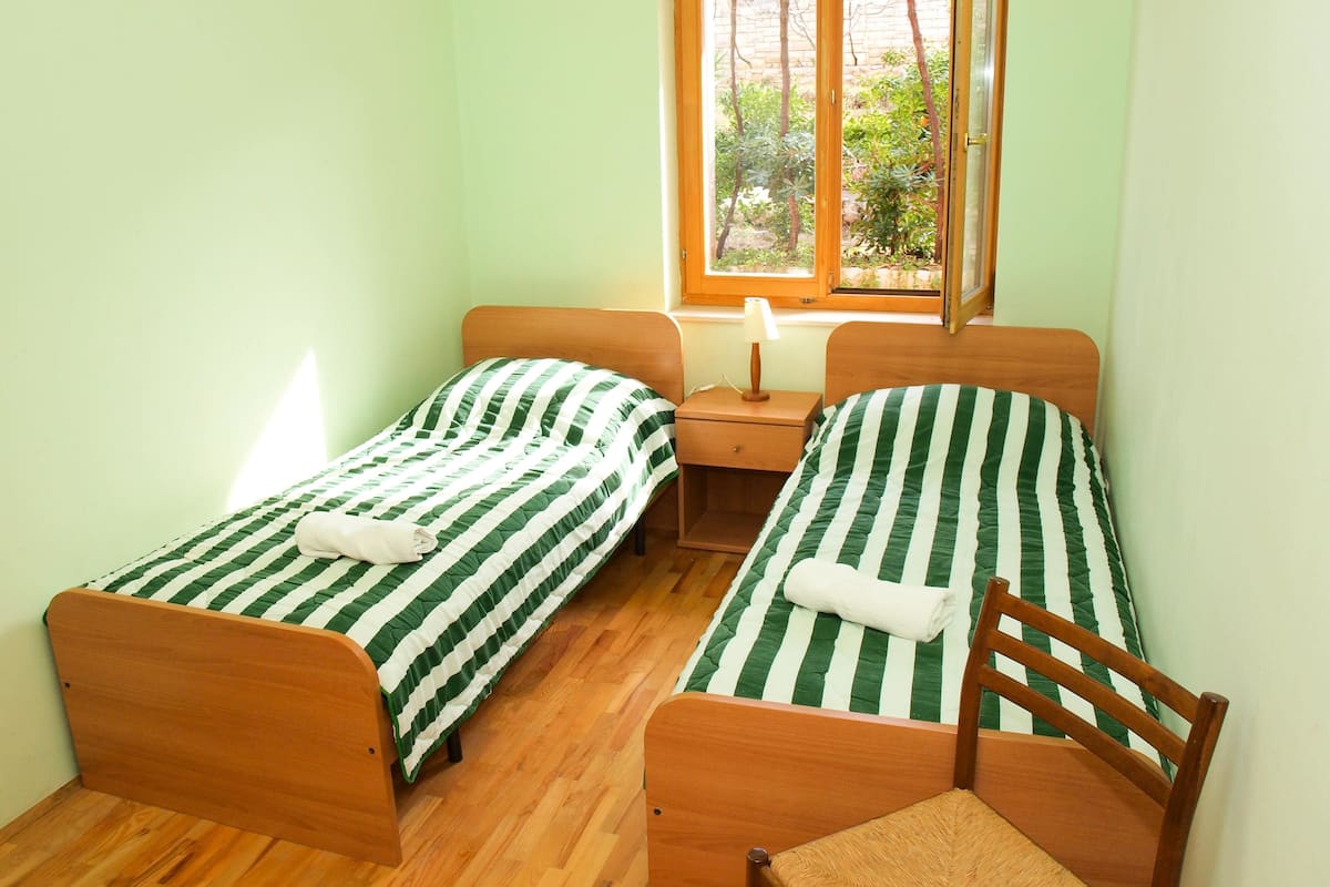 Appartement, Plusieurs lits | Accès au Wi-Fi (inclus), literie fournie