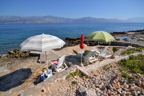 Appartement, Meerdere bedden | Uitzicht op strand/zee