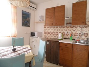Apartamento, 2 camas de casal | Comodidades da propriedade