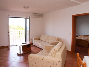 Apartment, Multiple Beds | Living room | TV - Apartments Šantić (Postira)
