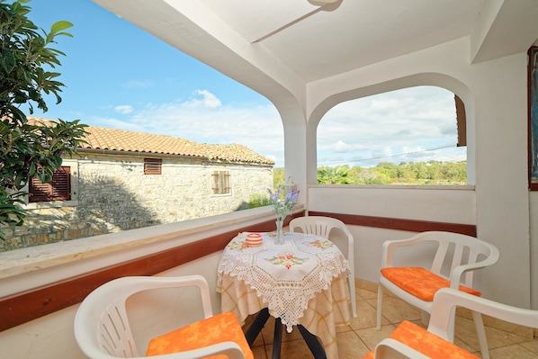 Appartement, plusieurs lits | Balcon