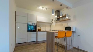 Vila, várias camas | Cozinha privada