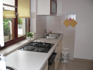 Apartment, Multiple Beds | Private kitchen