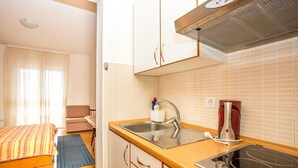 Appartement, 1 lit double et 1 canapé-lit | Cuisine privée | Surface de cuisson, vaisselle et ustensiles