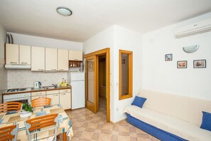 Apartment, 2 Double Beds | Living room | TV