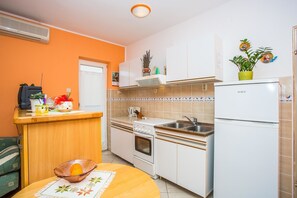 Apartment, Multiple Beds | Private kitchen | Stovetop, cookware/dishes/utensils - Apartments Čulina (Rab)