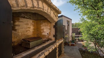 Appartement, plusieurs lits | Aire de pique-nique/barbecue