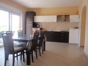 Apartment, Multiple Beds | Private kitchen | Oven, stovetop, dishwasher, cookware/dishes/utensils - Apartments Krešo / Stan Three Bedrooms A1 (Rab)