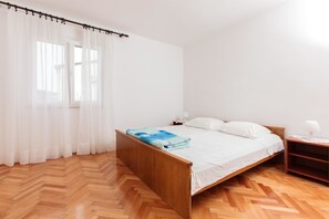 Appartement, plusieurs lits | Wi-Fi gratuit, draps fournis