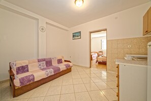 Apartment, Multiple Beds | Living room | TV, fireplace - Apartments Biondić (Senj)