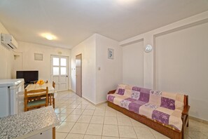 Apartment, Multiple Beds | Living room | TV, fireplace - Apartments Biondić (Senj)