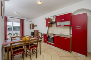 Appartement, plusieurs lits | Cuisine privée