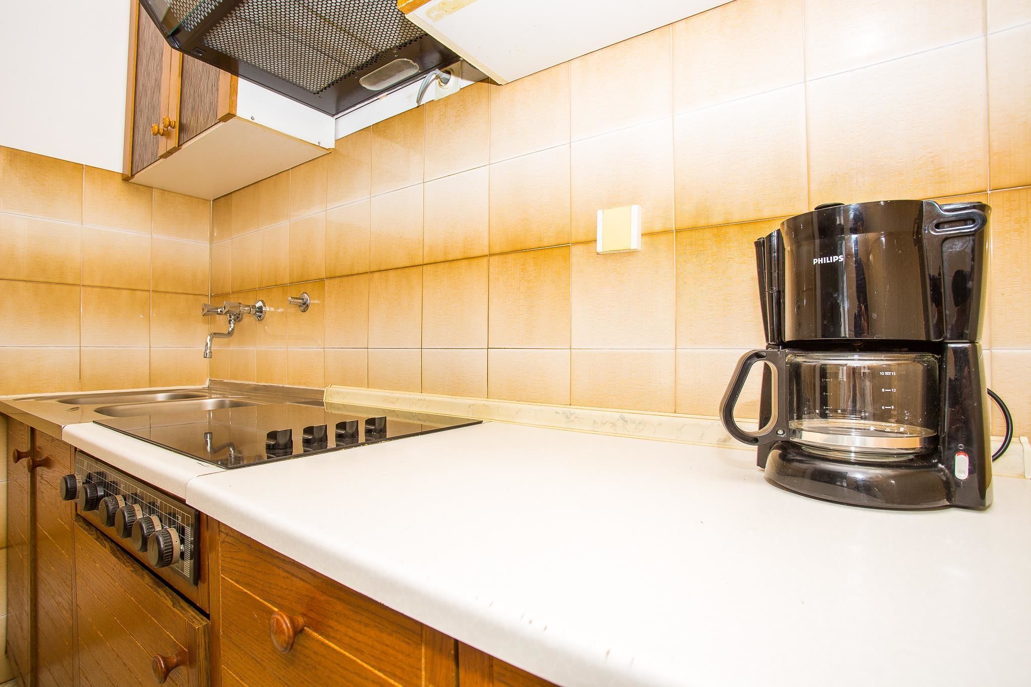 Apartment, Multiple Beds | Private kitchen | Stovetop, cookware/dishes/utensils