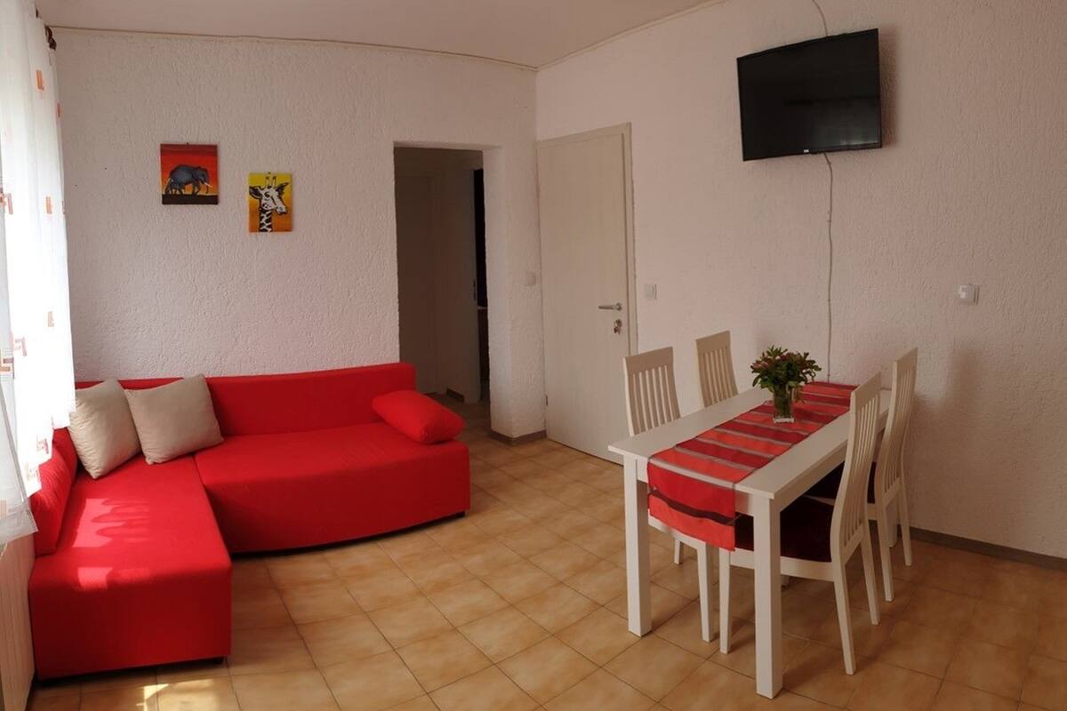 Apartment, Multiple Beds | Living room | TV