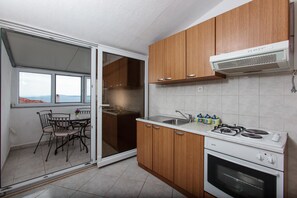 Apartment, Multiple Beds | Private kitchen | Oven, stovetop, cookware/dishes/utensils - Apartments Grgur (Okrug)