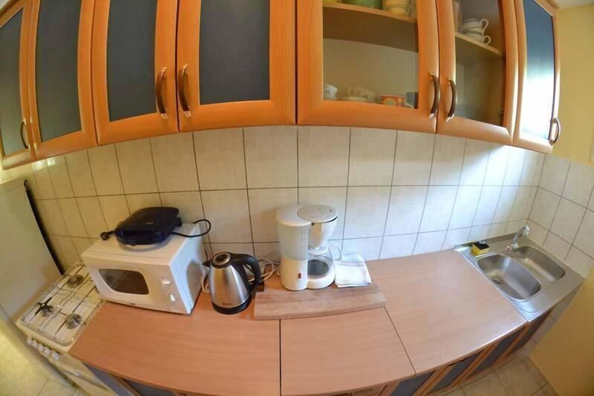 شقة - سريران مزدوجان | مطبخ خاص | موقد طهي مسطح، مستلزمات طهي/أطباق/أوعية