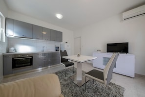 Apartamento, 1 cama Queen | Cozinha privada
