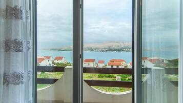 Apartment, Mehrere Betten | 1 Schlafzimmer, kostenloses WLAN, Bettwäsche