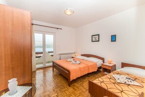 Apartamento, várias camas | 1 quarto, Wi-Fi de cortesia, roupa de cama
