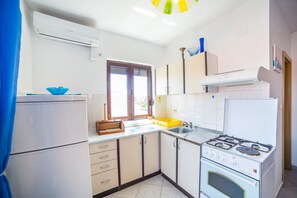 Lägenhet - flera sängar | Eget kök | Spishäll och grytor/köksredskap