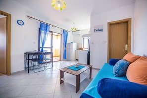 Apartment, Multiple Beds | Living room