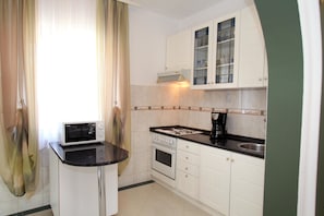 Apartment, Multiple Beds | Private kitchen | Oven, stovetop, cookware/dishes/utensils - Apartment Ivan / Three Bedroom A1 (Marina)