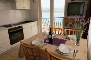 Apartment, Multiple Beds | Private kitchen