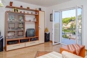 Apartment, Multiple Beds | Living room | TV - Apartments Bašković (Supetar)
