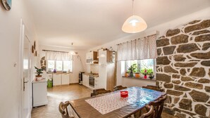 House, Multiple Beds | Private kitchen | Oven, stovetop, cookware/dishes/utensils - Holiday House Predrag (Rab)